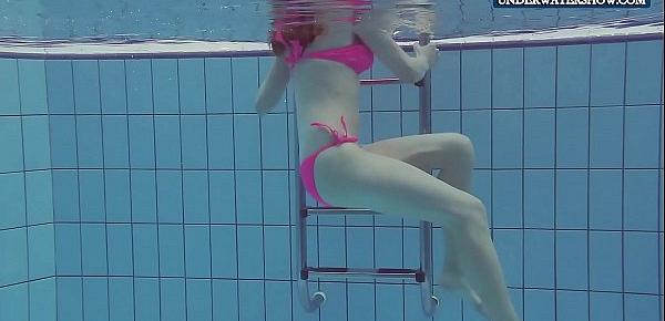  Wet teen Lera in the pool